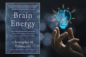 Cover of book BRAIN ENERGY by Christopher Palmer MD, and hand holding drawing virtual lightbulb with brain on bokeh background