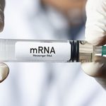 Doctor holding mRNA vaccine.