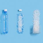 Three plastic water bottles in increasing stages of breakdown, representing the proliferation of microplastic pollution.