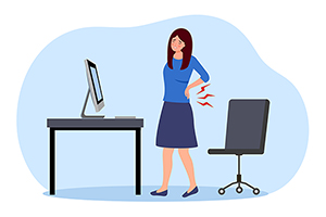 Illustration of woman with lower back pain from sitting all day at her desk