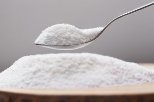 Spoon with natural sweetener on a heap